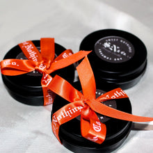 Load image into Gallery viewer, massage candle the sanctuary arousal candle 2 ounce black tin